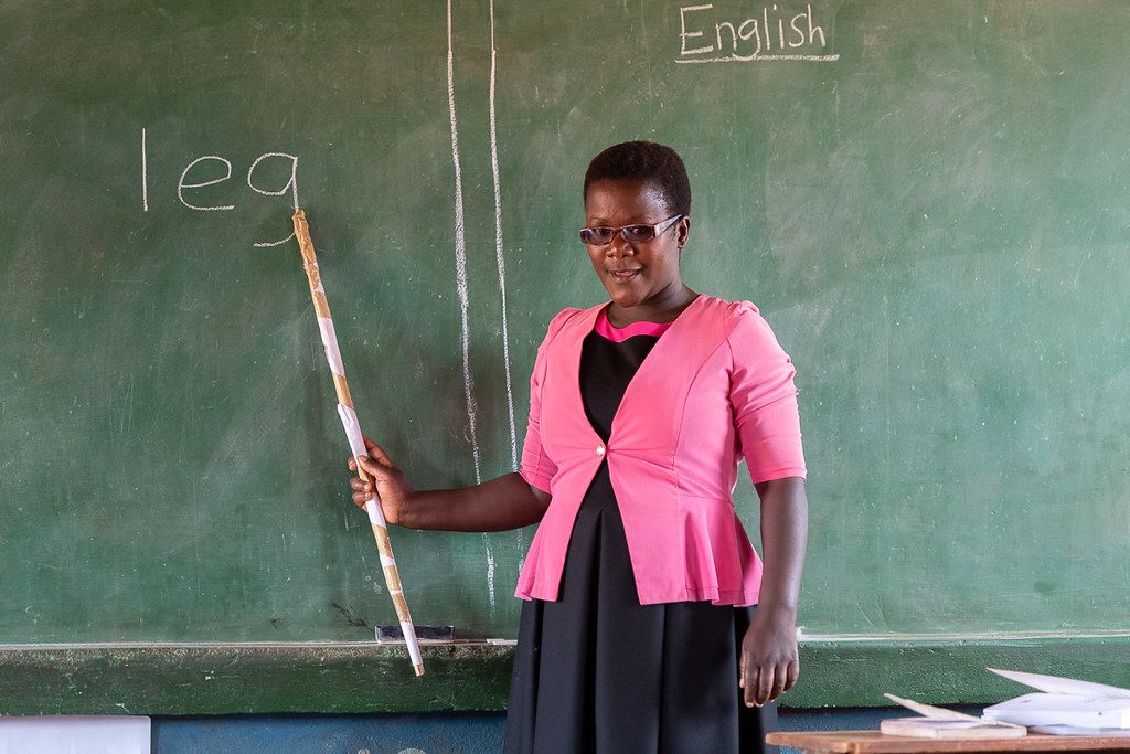 A teacher at the blackboard